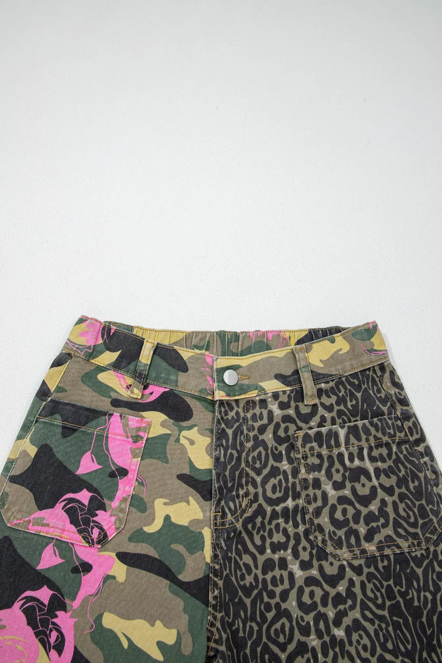 Contrast patchwork jeans with floral camo and leopard print, cotton material.