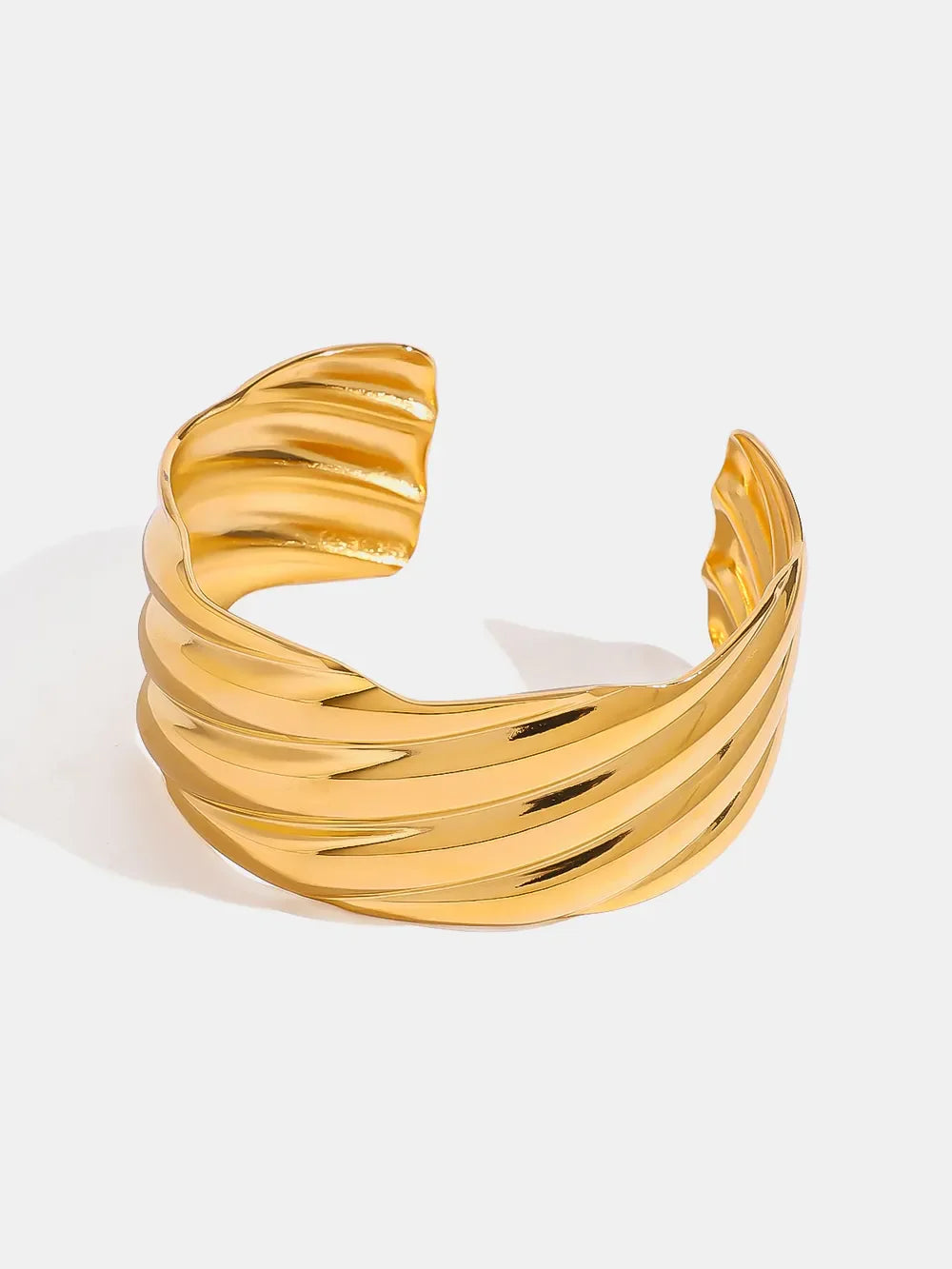 Gold cuff bracelet with sculpted wave texture, 18K gold-plated and adjustable