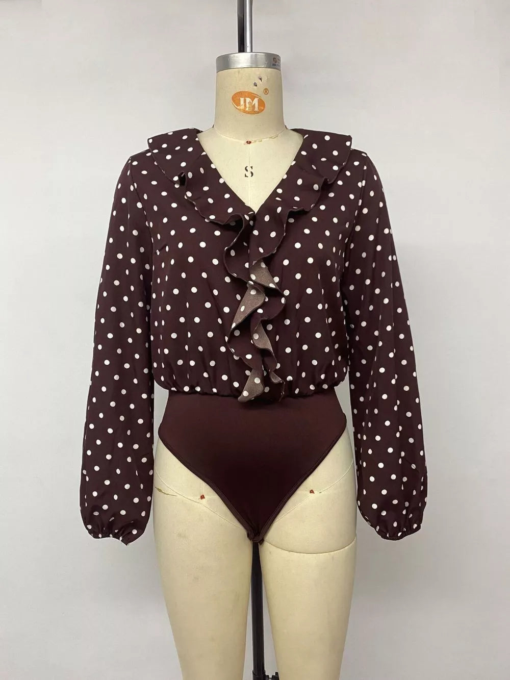 Polka Dot Ruffled V-neck Bodysuit in Coffee Brown with ruffled