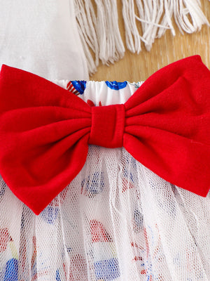 Baby outfit set with red bow and patriotic print skirt.