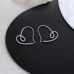 925 sterling silver Care instructions: Avoid wearing during exercise, as sweat w earrings in Silver with dangle silhouette