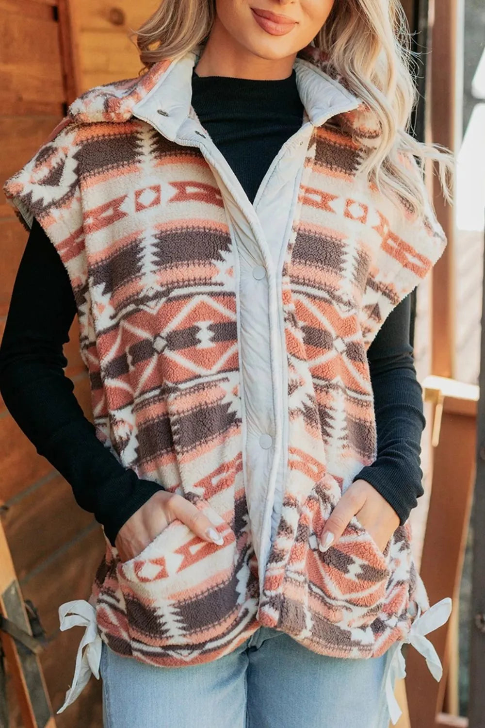 rust vest featuring hooded and geometric