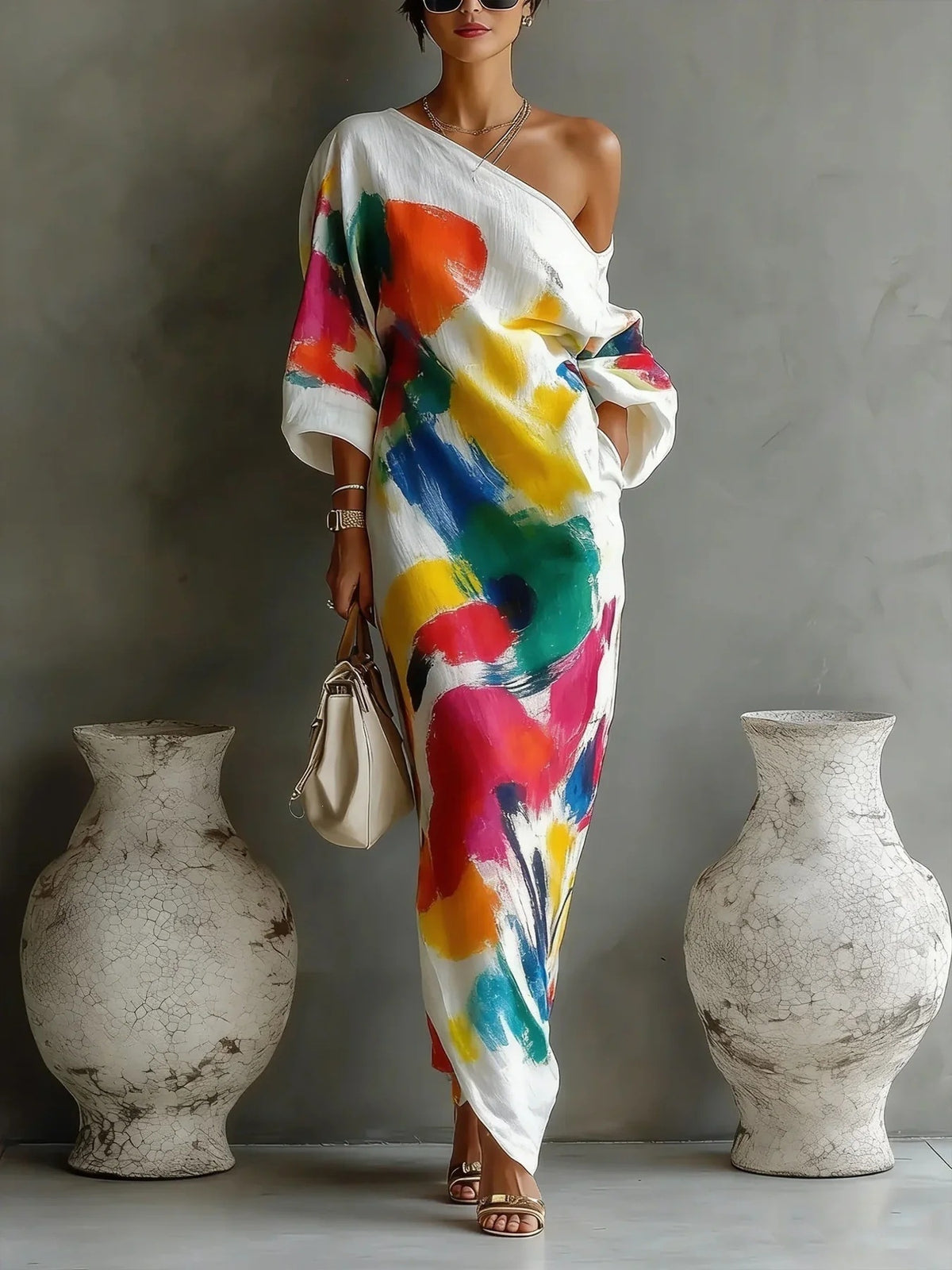 white maxi dress with abstract and one-shoulder