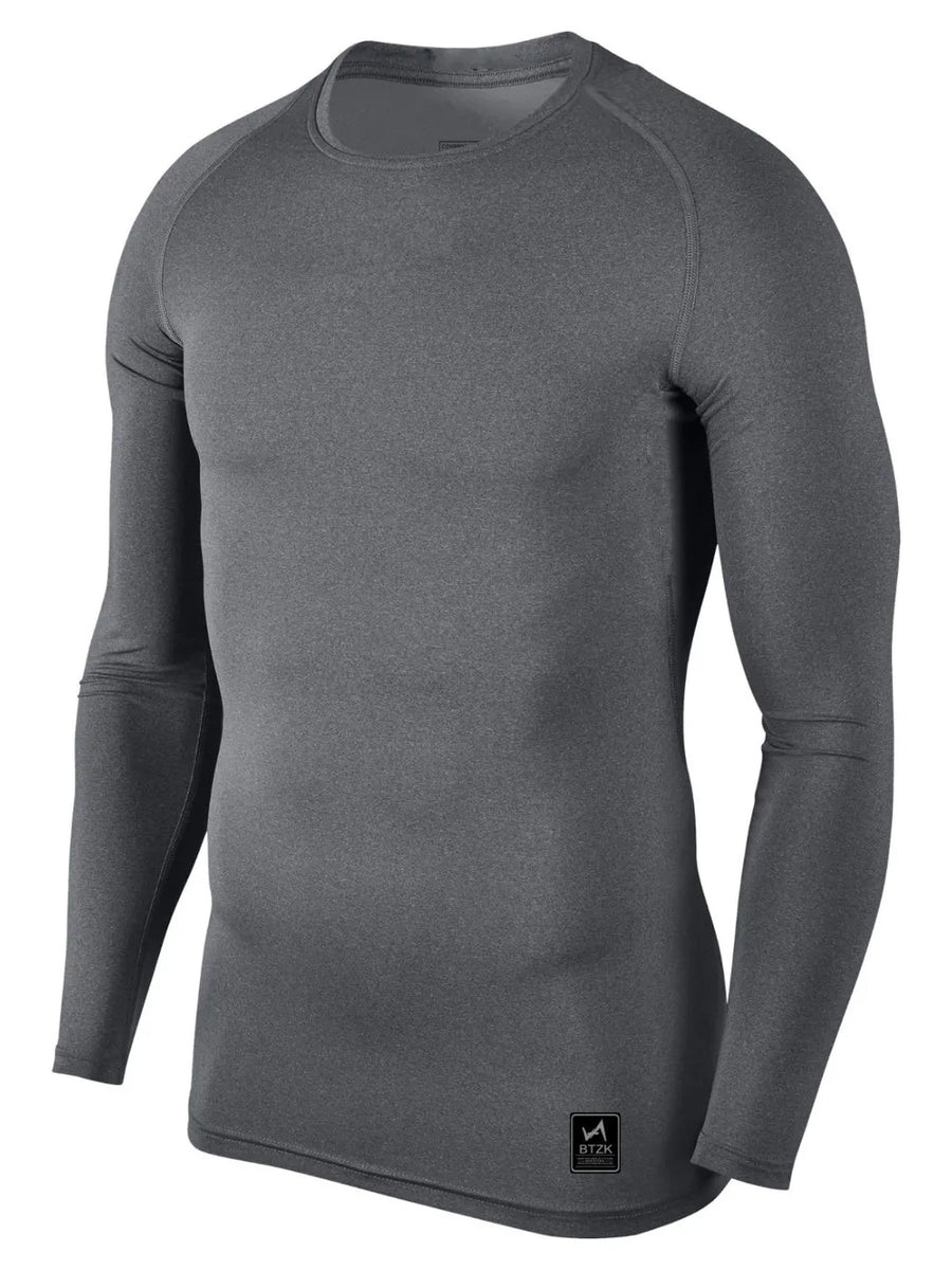 Dark Gray performance long sleeve tee with crew neck and logo detail.