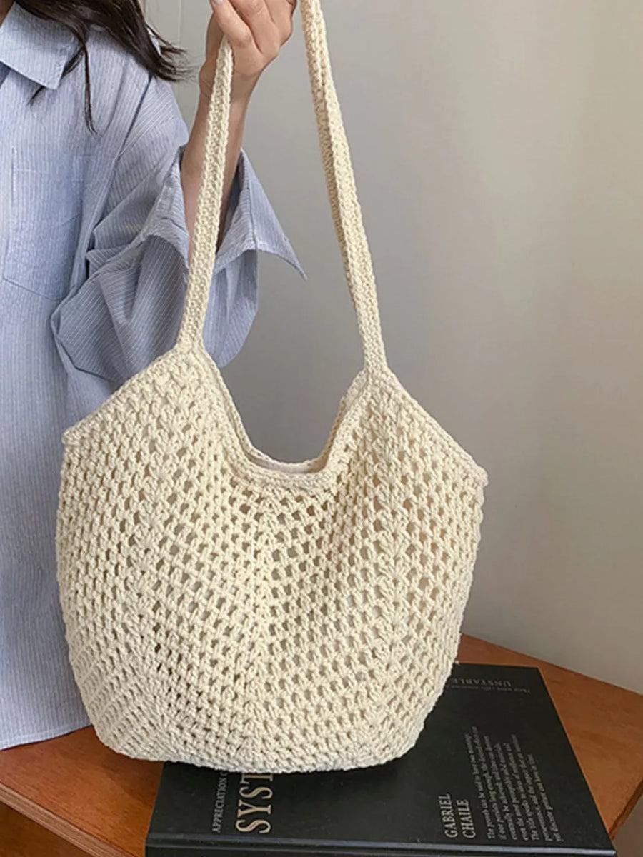 Chevron woven straw shoulder bag in Rice White with braided straps and open crochet detail.