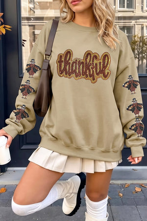 khaki sweatshirt with graphic and crew neck
