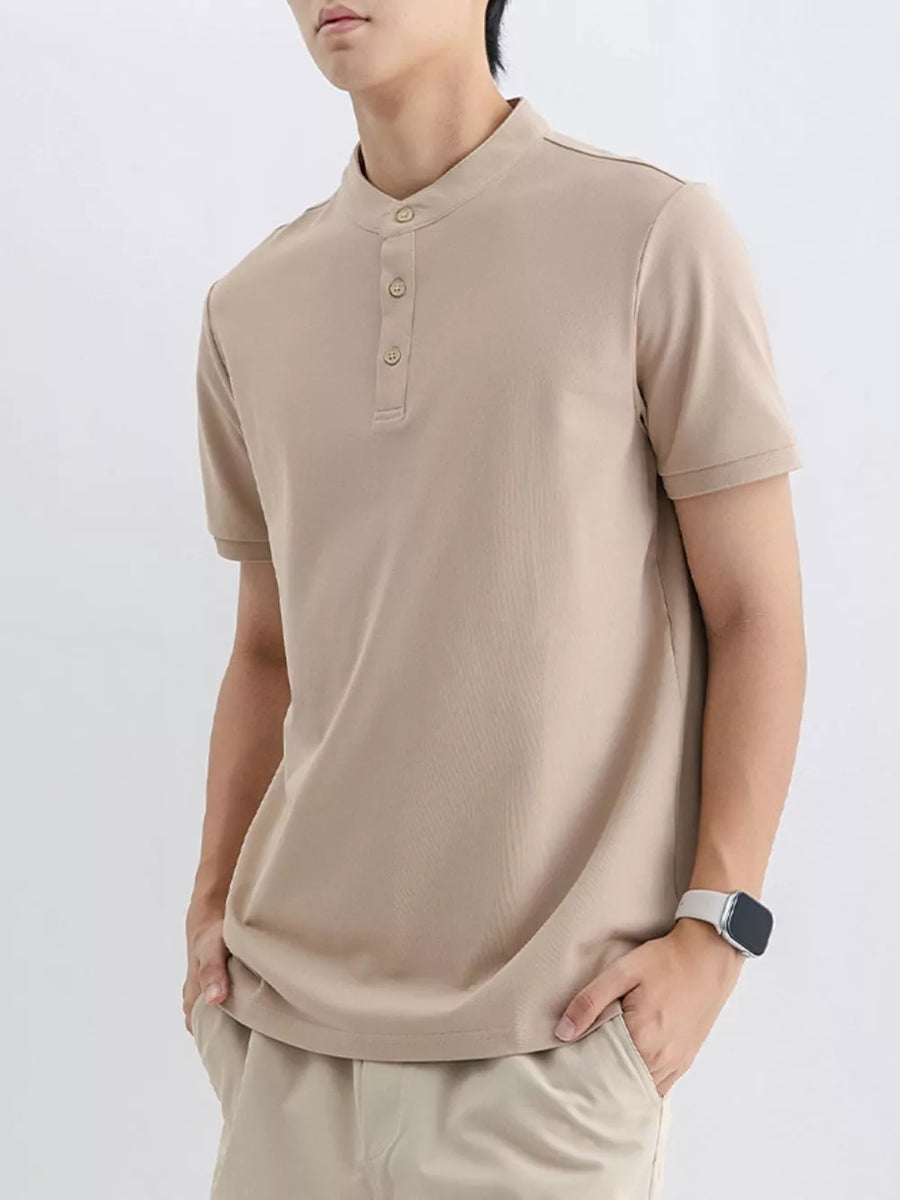 Men's short sleeve t-shirt in apricot with mandarin collar and button placket.
