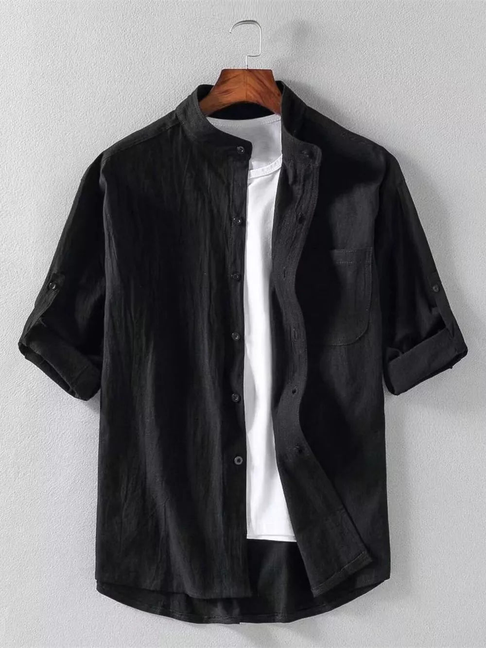 Black band collar button-up shirt with rolled sleeves and chest pocket.