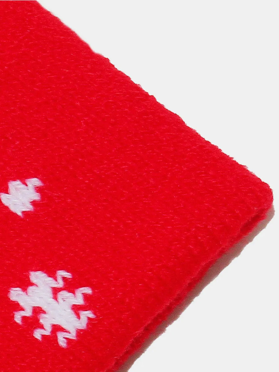 Red acrylic beanie with white Santa face pattern