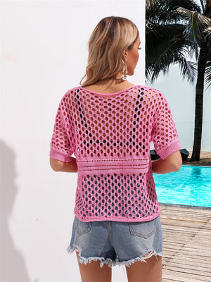 Hot Pink open-knit crochet cover-up with short sleeves and a drawstring detail.