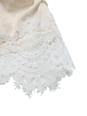 Cream knit sweater with white lace trim