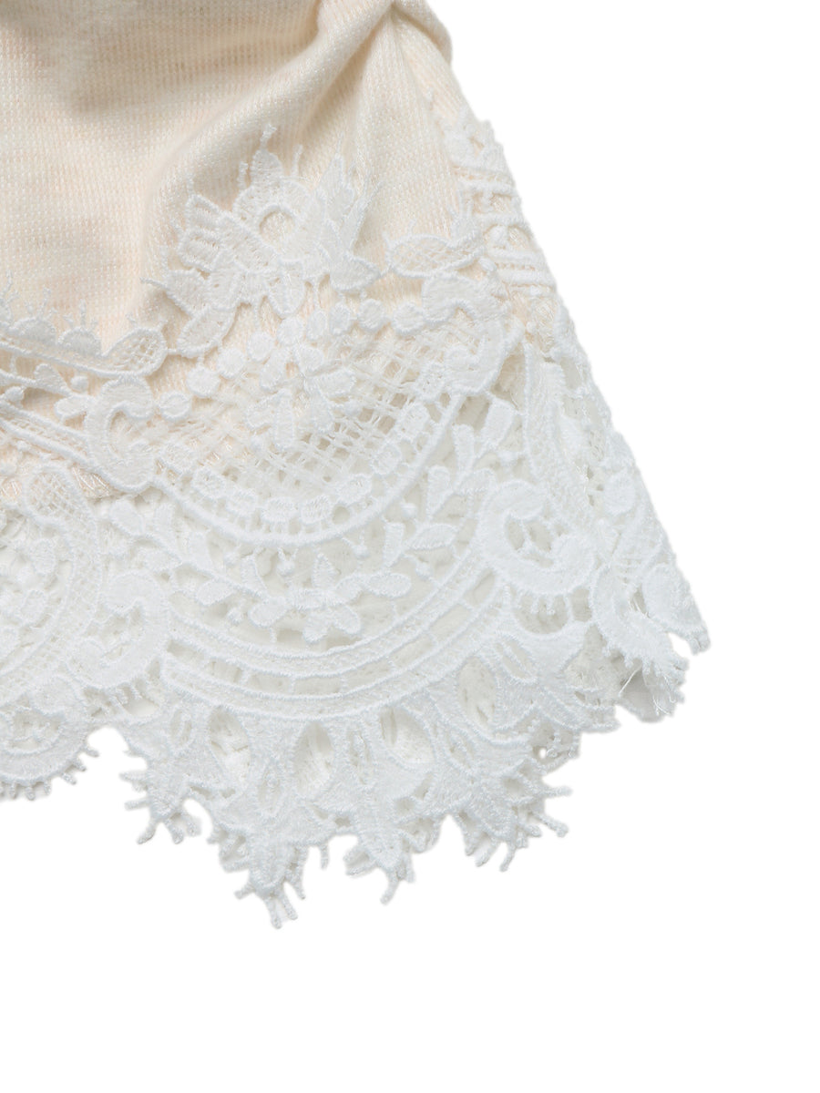 Cream knit sweater with white lace trim