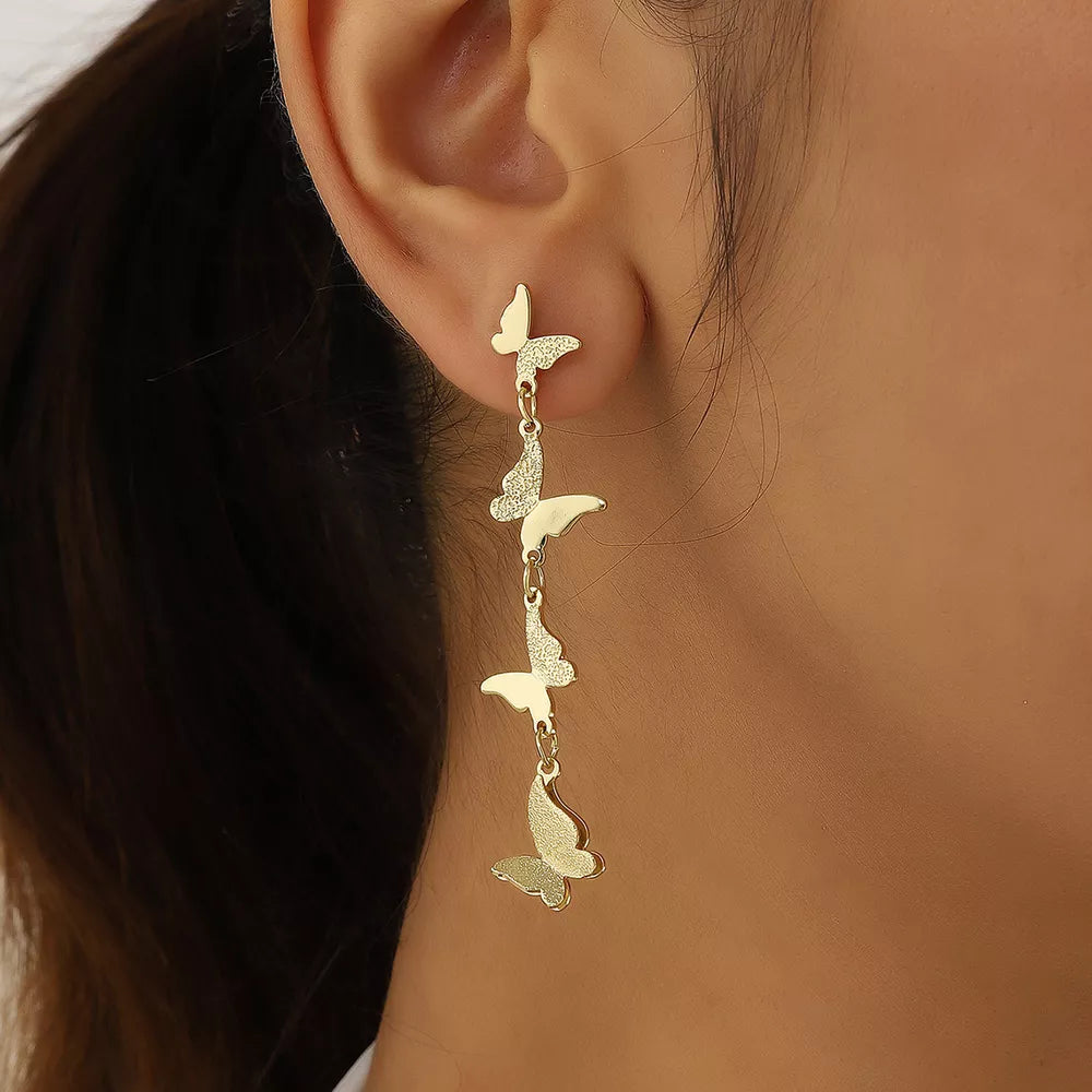 gold earrings with butterfly and not applicable
