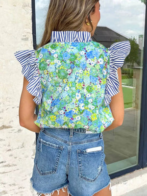 Floral cotton blouse with ruffled striped sleeves and collar.