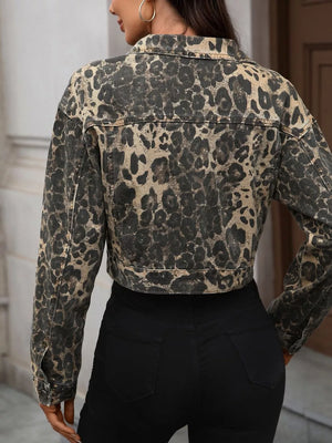 Leopard print cropped denim trucker jacket with button cuffs and collar.