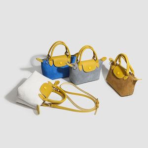 crossbody bag in royal blue featuring two-tone and structured fit