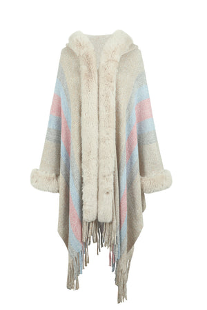 Textured stripe poncho with faux fur trim and fringe detail.