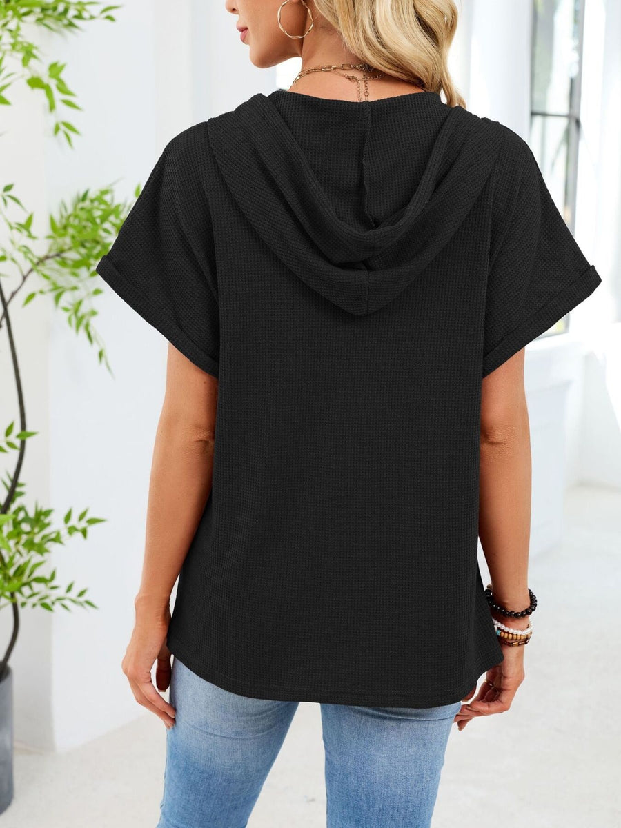 Black waffle knit short sleeve hooded top with rolled cuffs