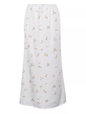 White maxi skirt with a delicate yellow floral print and elastic waist