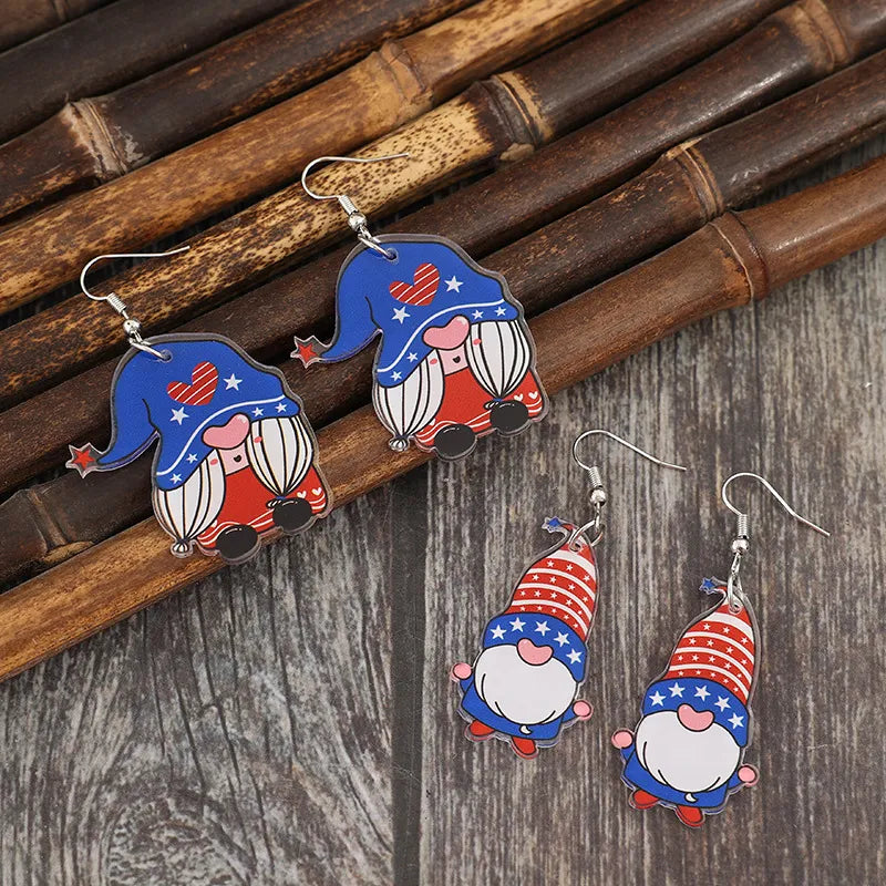 Patriotic gnome acrylic dangle earrings in royal blue with stars and hearts.