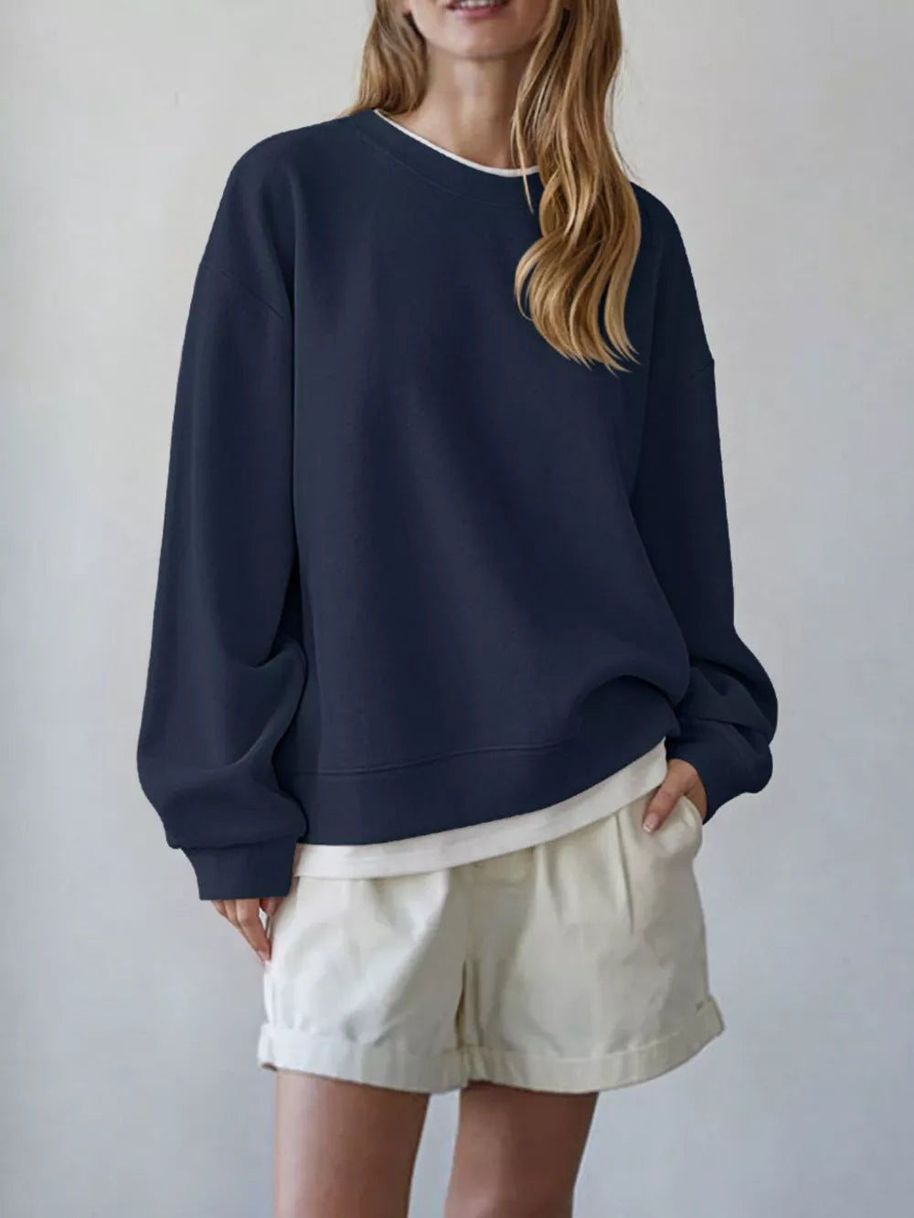 red sweatshirt with ribbed hem and long sleeve