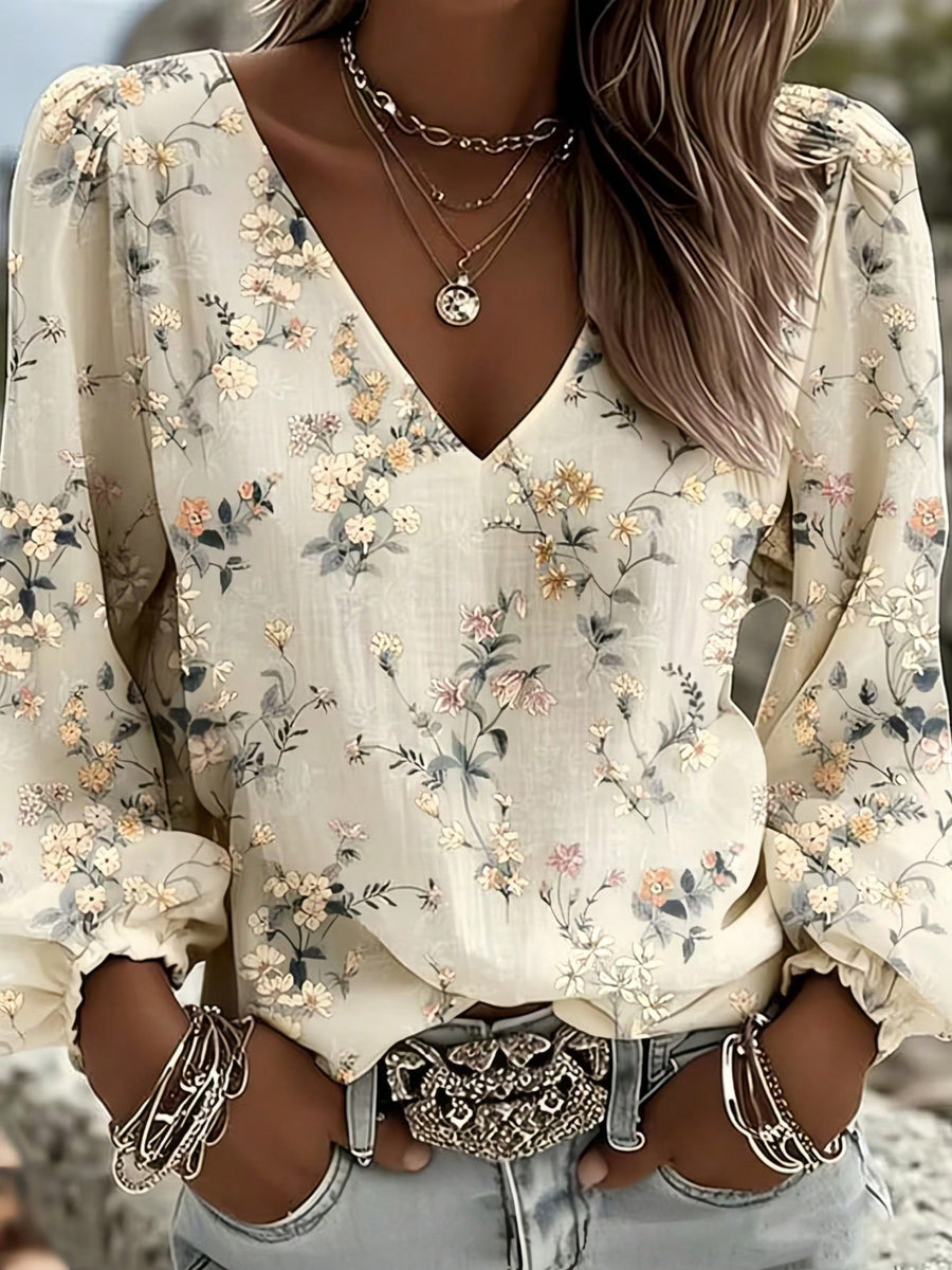 light yellow blouse featuring v-neck and ditsy floral