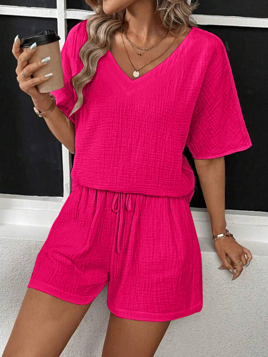 Hot Pink textured gauze lounge set with V-neck top and drawstring shorts.