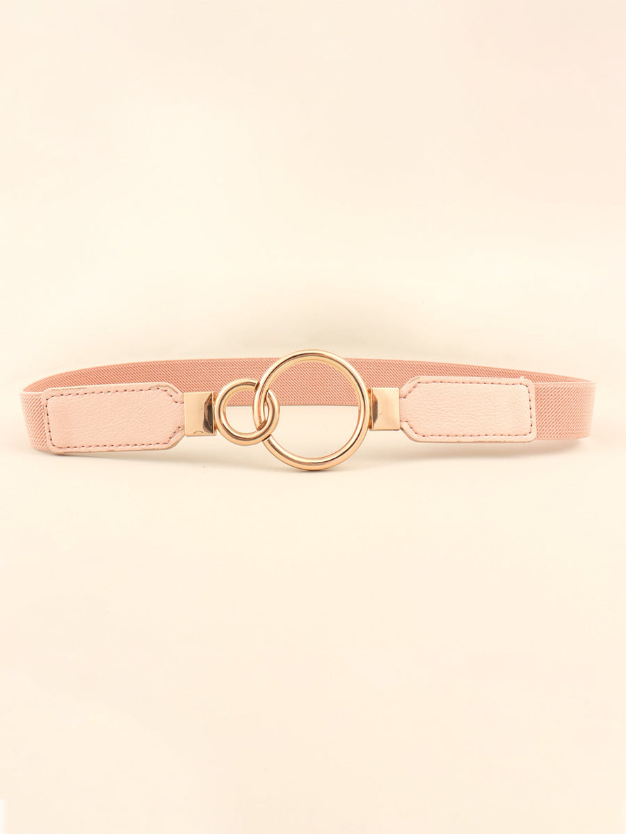 Peach elastic belt with interlocked gold rings and faux leather ends