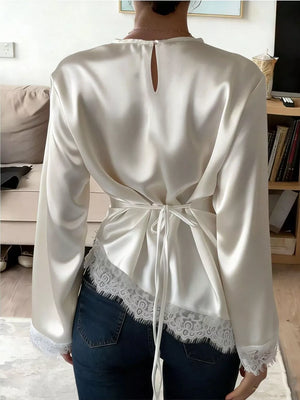 100% polyester Care instructions: Machine wash cold blouse in Black with relaxed silhouette