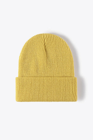 Yellow ribbed knit beanie with a cuffed hem