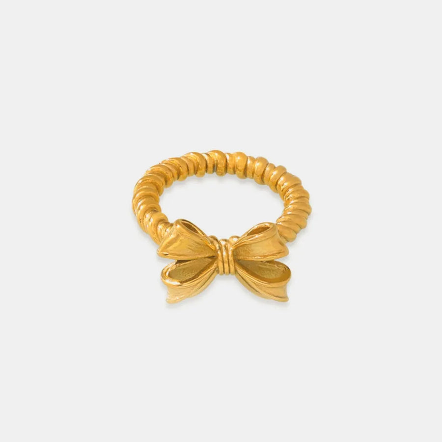 Gold textured ring with a bow knot detail
