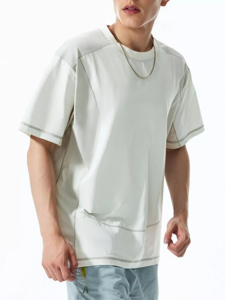 Relaxed fit t-shirt in Coconut Milk White with contrast stitching detail.