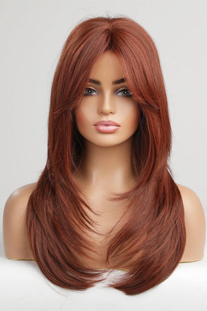 Layered copper red synthetic wig with chic bangs and face-framing layers.
