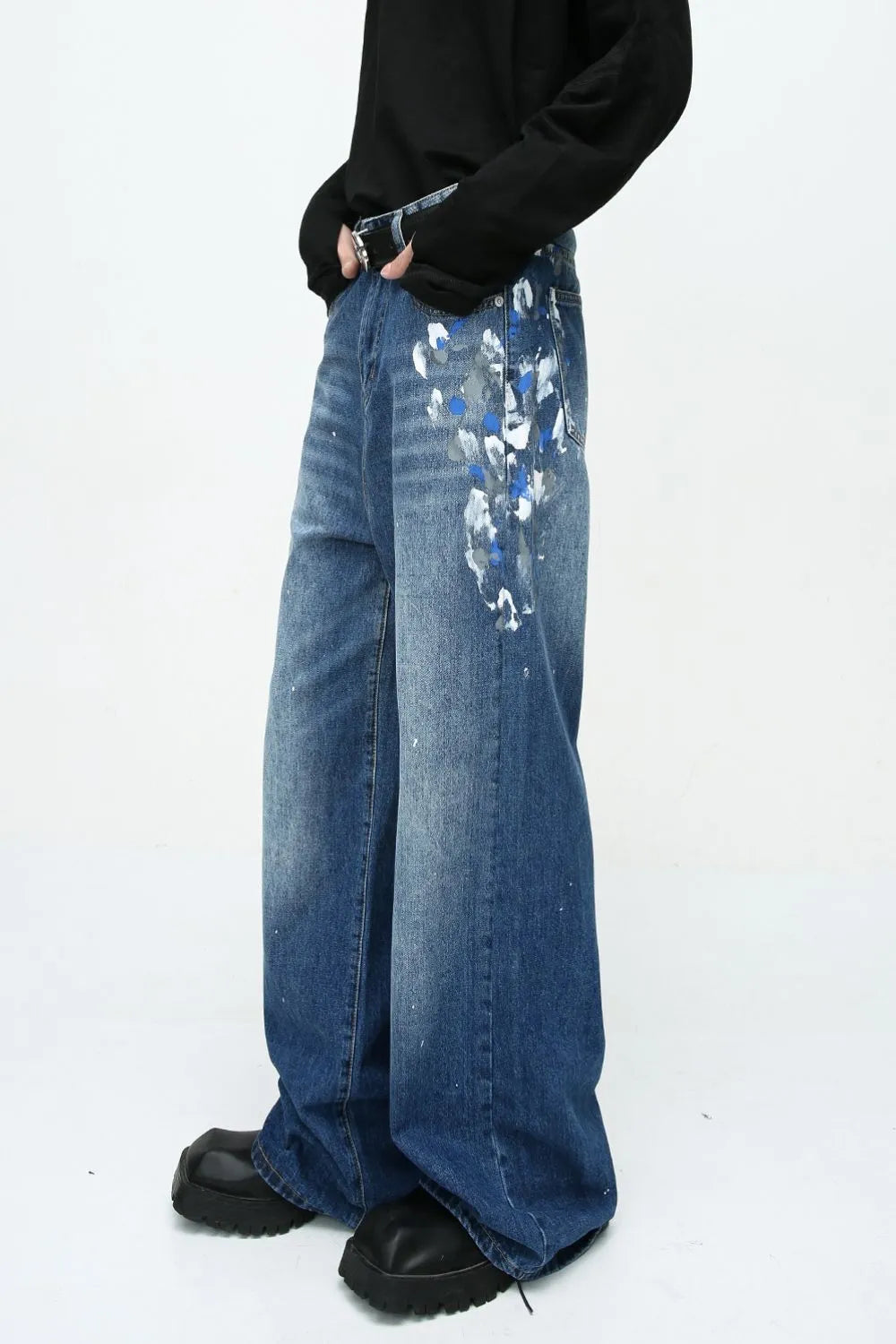 Painterly Wash Wide Leg Jeans in Medium blue denim with artistic brushstroke details and a relaxed fit.