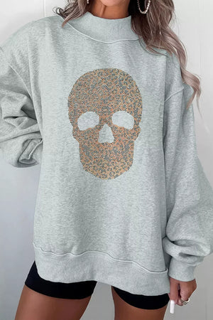 light grey sweatshirt with graphic print and mock neck