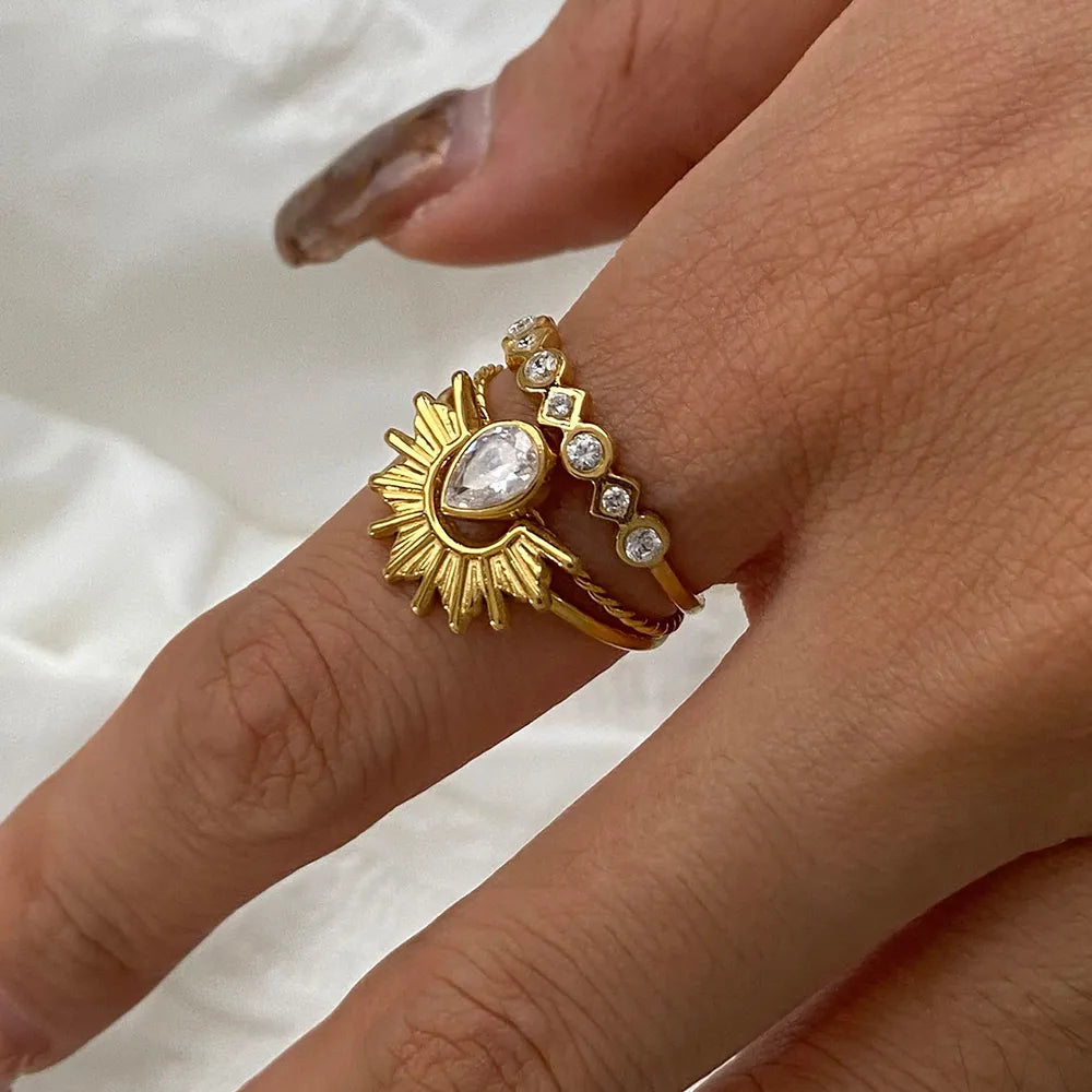 ring in gold featuring rhinestone accents and stacked fit