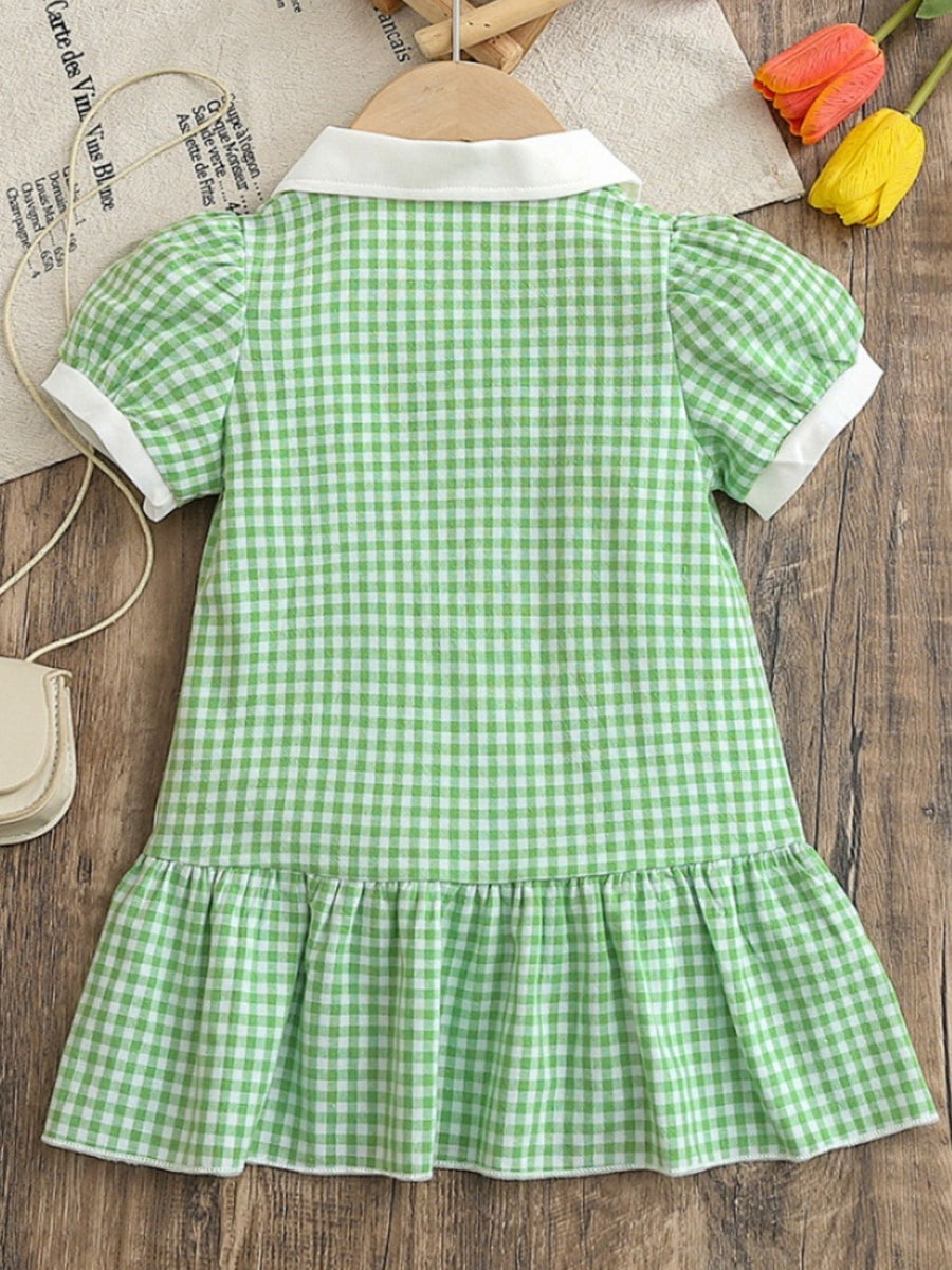 Baby gum leaf gingham polo dress with white collar, cuffs, and ruffle hem.