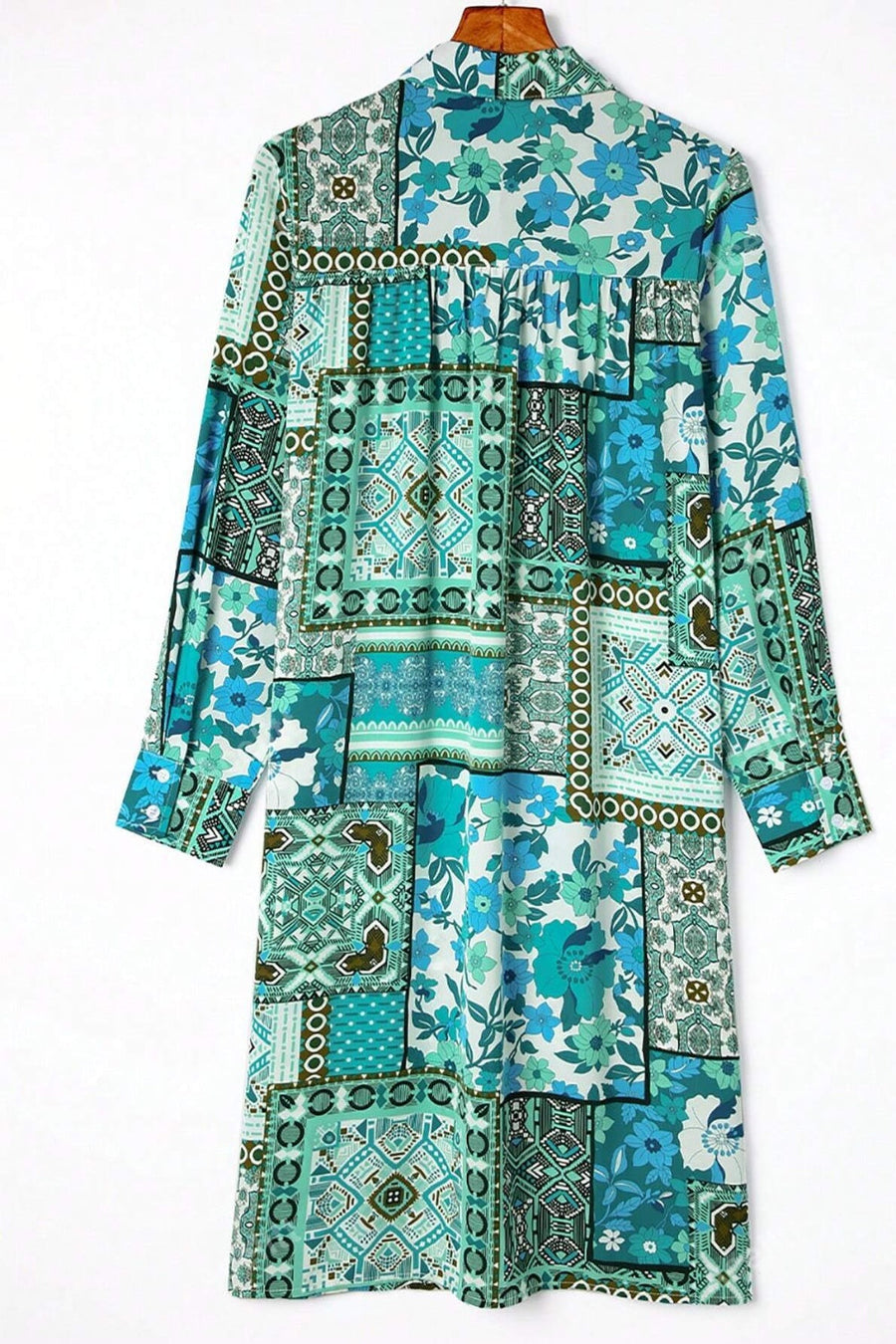 Patchwork print duster shirt jacket in blue and turquoise with floral and geometric patterns.