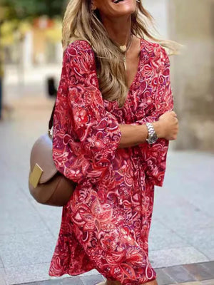 rust mini dress featuring tied and paisley