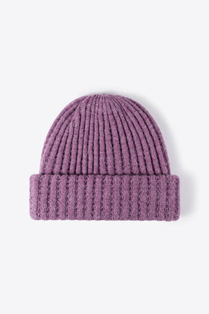 Purple ribbed knit beanie with a cuffed hem.