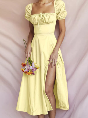 Pastel yellow puff sleeve tie front midi dress with square neckline and thigh slit.