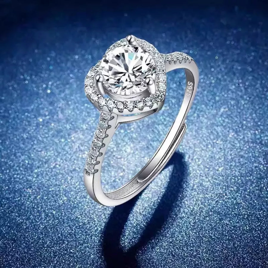 white ring featuring moissanite stone and halo