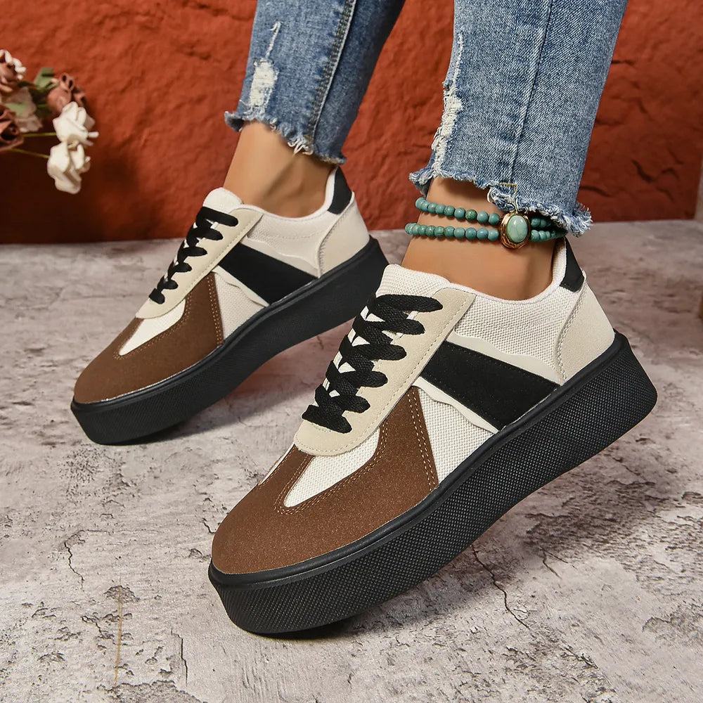 Panelled platform sneakers in beige, brown, and black with contrast detailing.