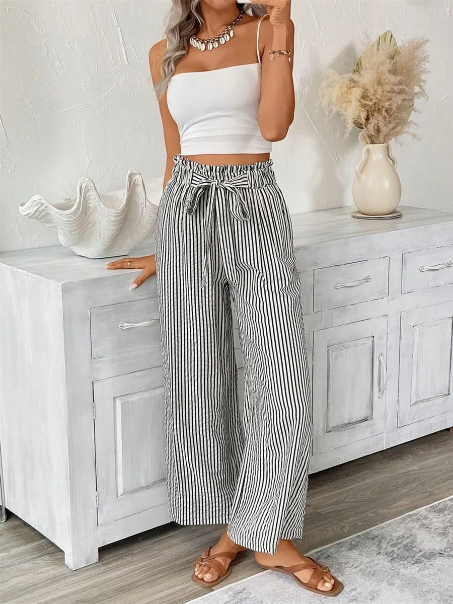 Striped paper bag maternity pants with a tie waist and wide leg