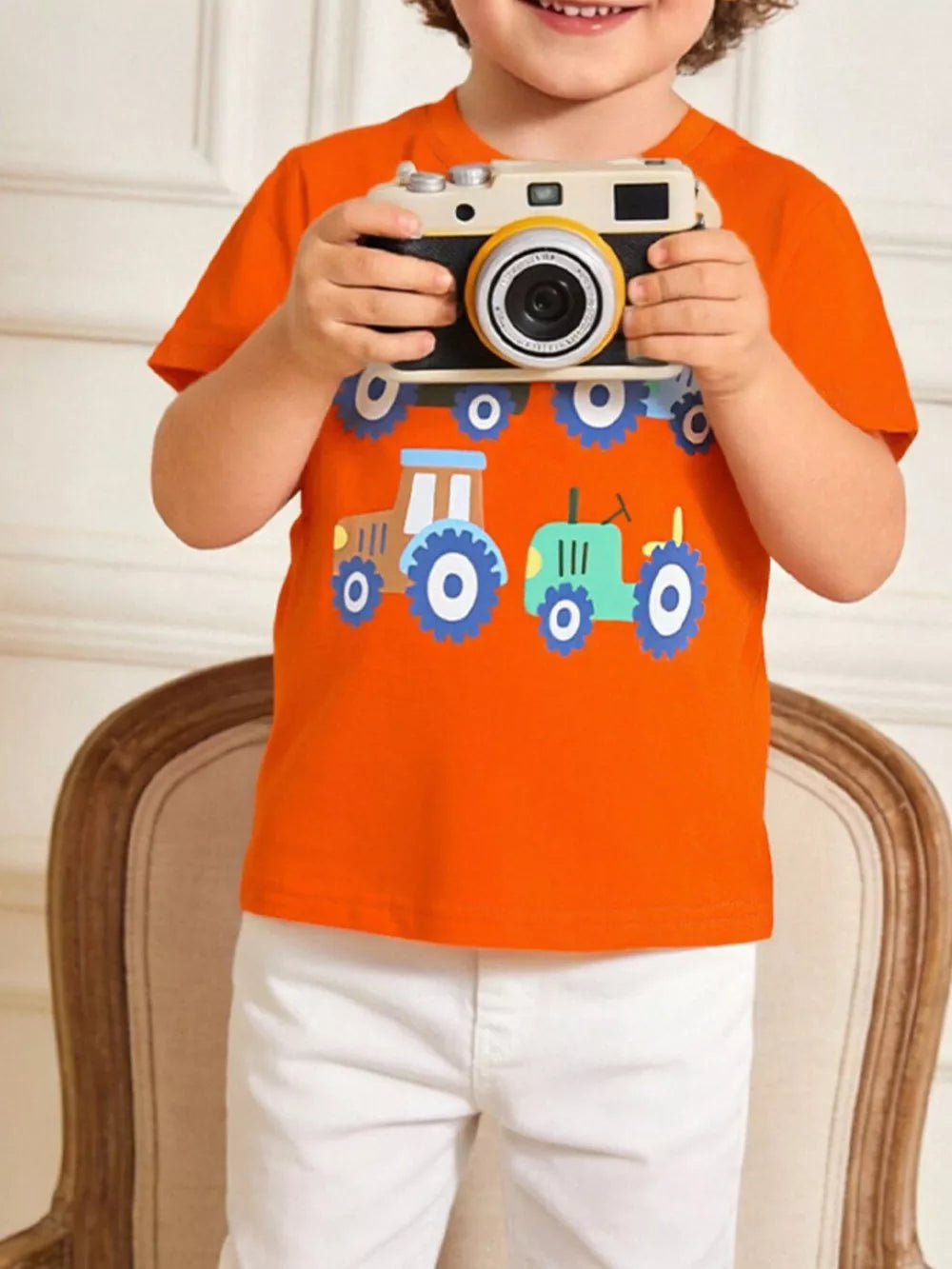 Orange cotton crew neck t-shirt with tractor print