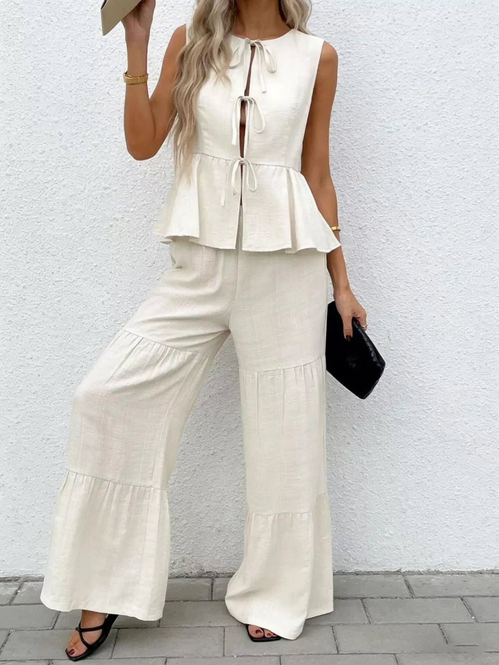 Beige ruffled tie-front peplum top with tiered wide-leg pants set