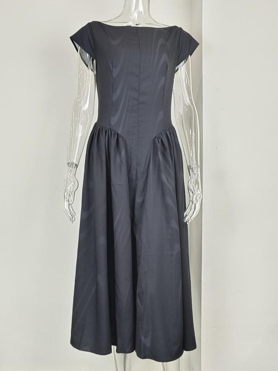 Black cap sleeve A-line midi dress with boat neck and subtle striped pattern.