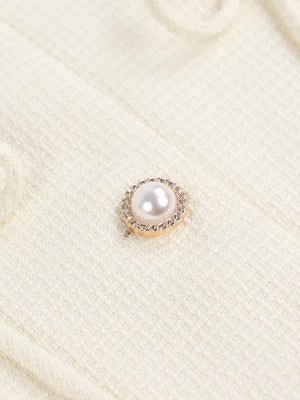 Cream knit cardigan with pearl button detail