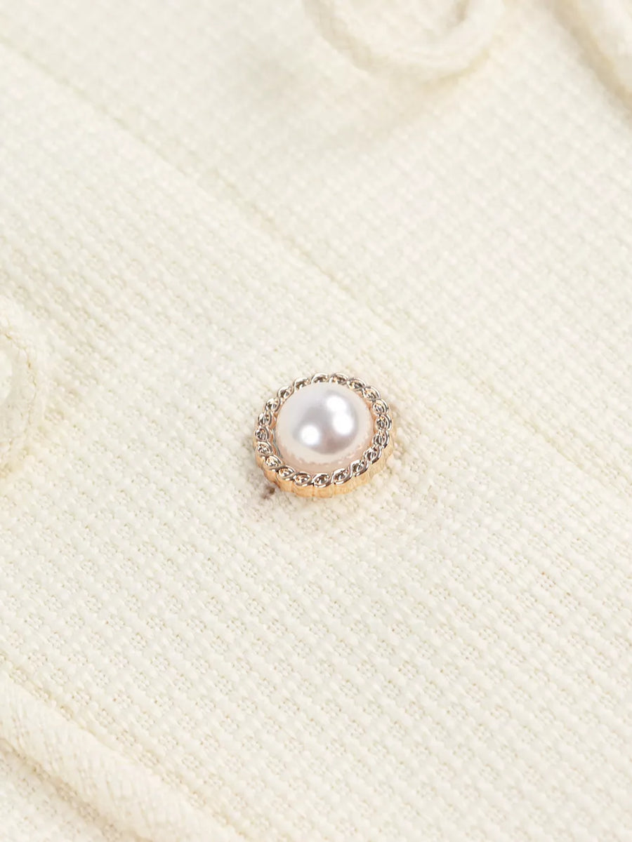 Cream knit cardigan with pearl button detail