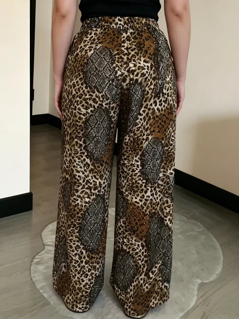 wide-leg pants featuring leopard-print in charcoal with 100% polyester Care instructions: Machine wash cold texture
